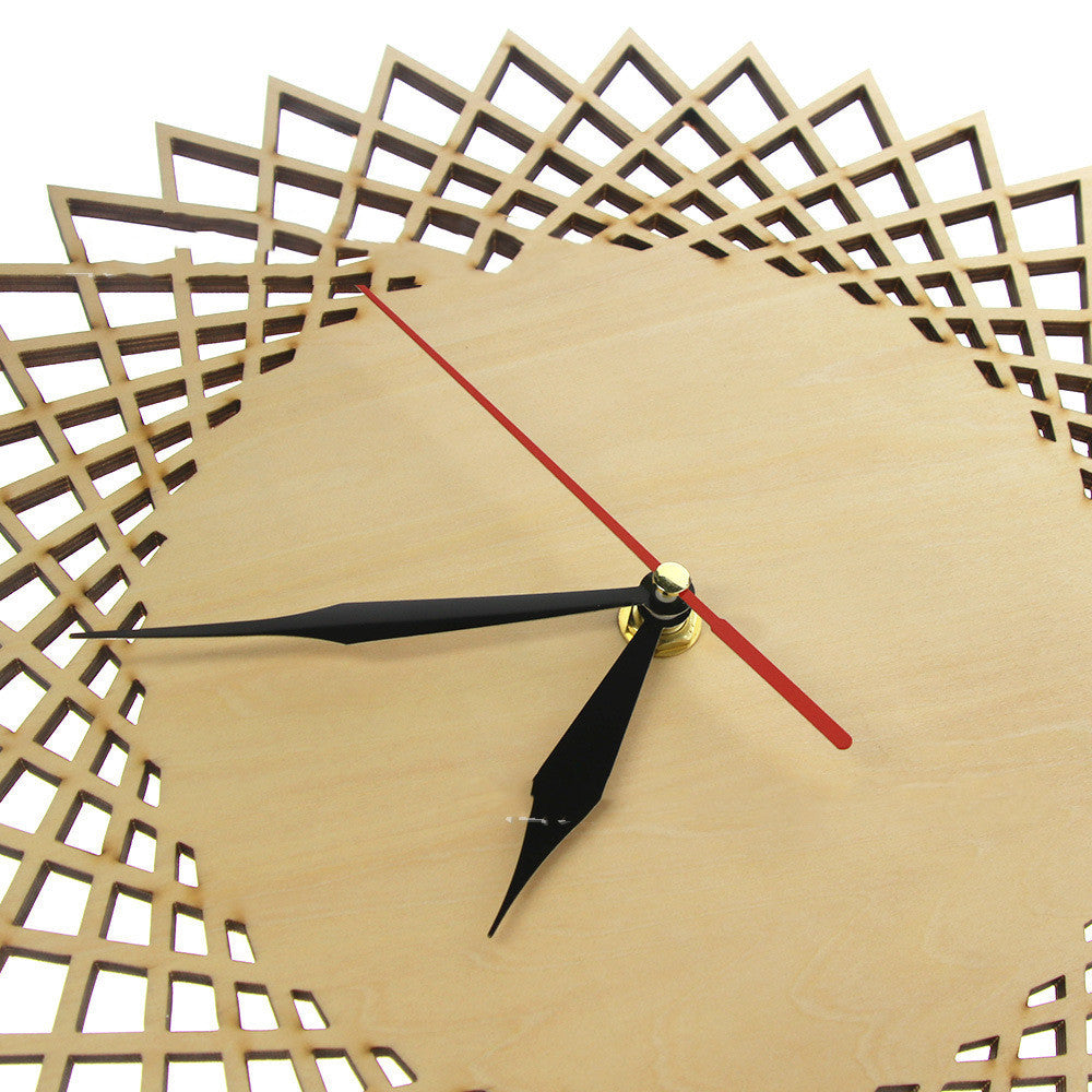 Minimalist wooden wall clock hanging in a bright living room