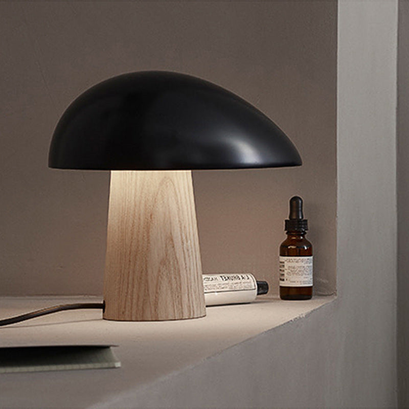 Black and white dome table lamps side by side in modern home