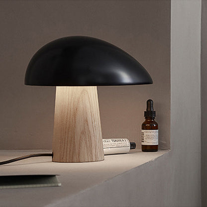 Black and white dome table lamps side by side in modern home