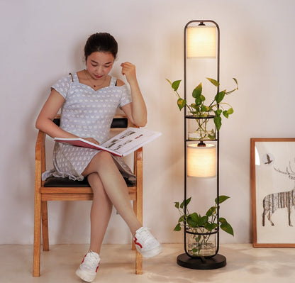 Decorative floor lamp with integrated planters and soft glow
