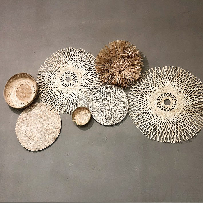 Handcrafted rattan wall hangings in boho style arrangement
