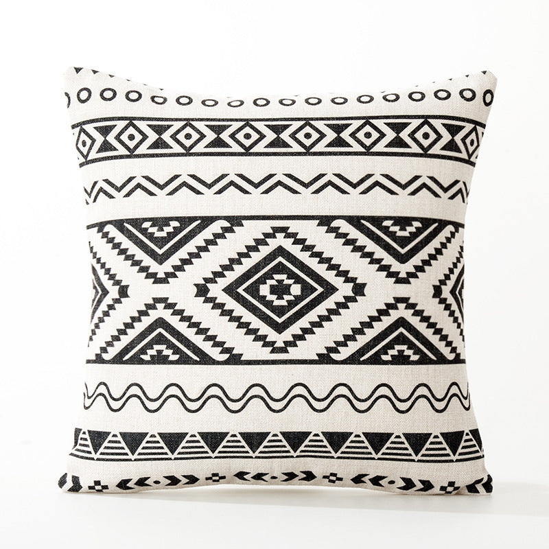 Set of assorted Nordic geometric cushion covers on sofa